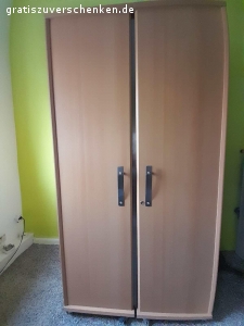 Arbeitstisch mit Flügeltüren. Für Selbstabholer zu verschenken. Abholung in Gelsenkirchen Feldmark, Nähe Altstadt.
H 195 cm, L 100–200 cm, T 75 cm.