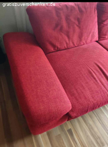 Ein Ecksofa in Lara Rot. das Sofa ist 316 x184
Metallfüße 
Und es hat eine Schlaffunktion 
Die Sitzfläche ist Kaltschaum